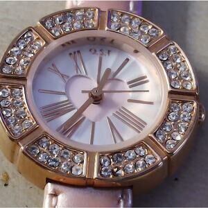 Elegant rose gold O.S.T. watch with a heart cutout dial matching band romanticfn
